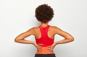 Active Woman Exercising With Lower Back Pain V2 2